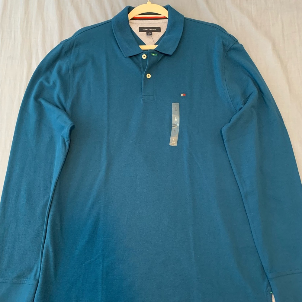 Tommy Hilfiger. Men Blue long sleeve Polo shirt . New with label. Size L.